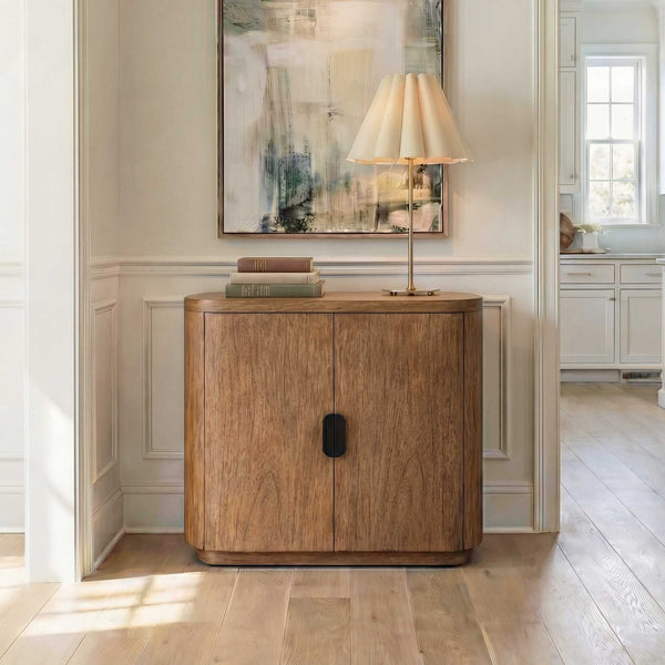 Uttermost Newell Mindi Wood Accent Cabinet with Curved Silhouette and Bronze Pull
