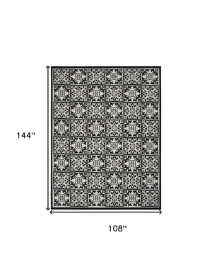 Homeroots 9' X 12' Black And White Fleur De Lis Stain Resistant Non Skid Area Rug  Polypropylene 505587