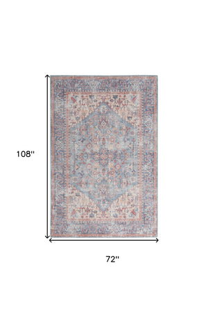 Homeroots 6' X 9' Blue And Orange Medallion Distressed Washable Area Rug  Polyester 505600