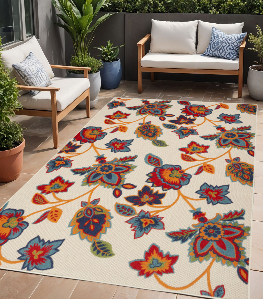 Homeroots 5' X 8' Gray Blue And Orange Floral Non Skid Indoor Outdoor Area Rug  Polypropylene 505618