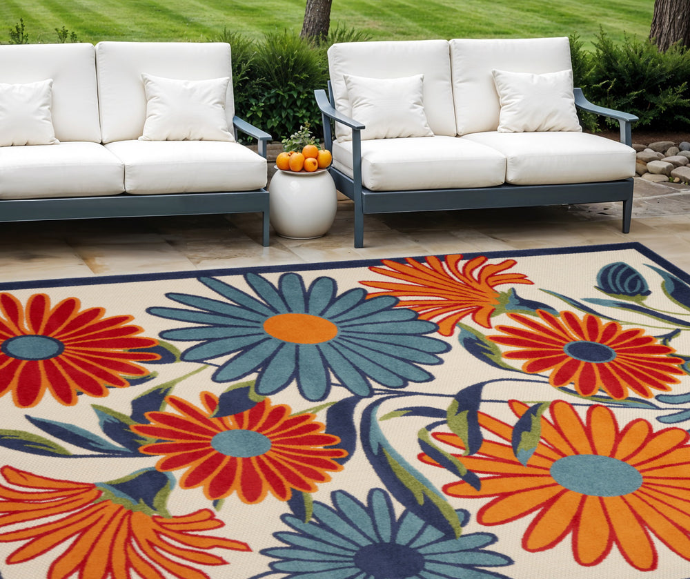 Homeroots 8' X 11' Ivory Blue And Orange Floral Non Skid Indoor Outdoor Area Rug  Polypropylene 505649