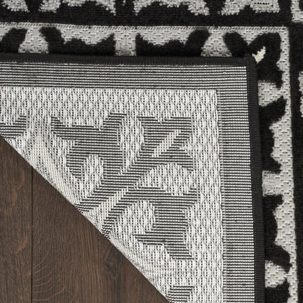 HomeRoots 9' Black and White Fleur De Lis Area Rug - Stain Resistant, Non-Skid, Elegant Design for Any Room 6' X 9' 505650