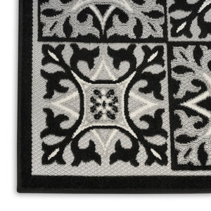 HomeRoots 9' Black and White Fleur De Lis Area Rug - Stain Resistant, Non-Skid, Elegant Design for Any Room 7' X 10' 505651