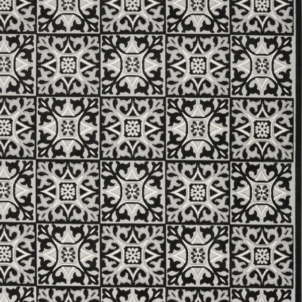 Homeroots 5' X 8' Black And White Fleur De Lis Stain Resistant Non Skid Area Rug  Polypropylene 505653