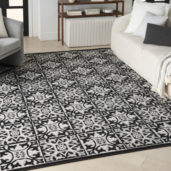 HomeRoots 9' Black and White Fleur De Lis Area Rug - Stain Resistant, Non-Skid, Elegant Design for Any Room 5' X 8' 505653