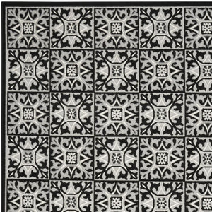 HomeRoots 8' X 11' Geometric Non-Skid Indoor Outdoor Area Rug - Modern Design for High Traffic Spaces & Easy Care Black, White 505654