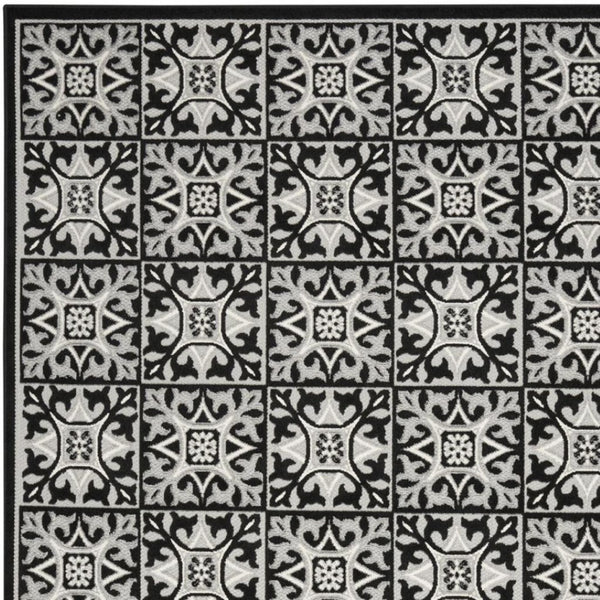 HomeRoots 8' X 11' Geometric Non-Skid Indoor Outdoor Area Rug - Modern Design for High Traffic Spaces & Easy Care Black, White 505654