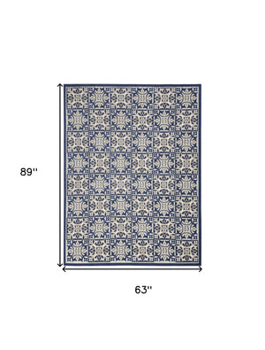 Homeroots 5' X 8' Blue Fleur De Lis Stain Resistant Non Skid Area Rug  Polypropylene 505658