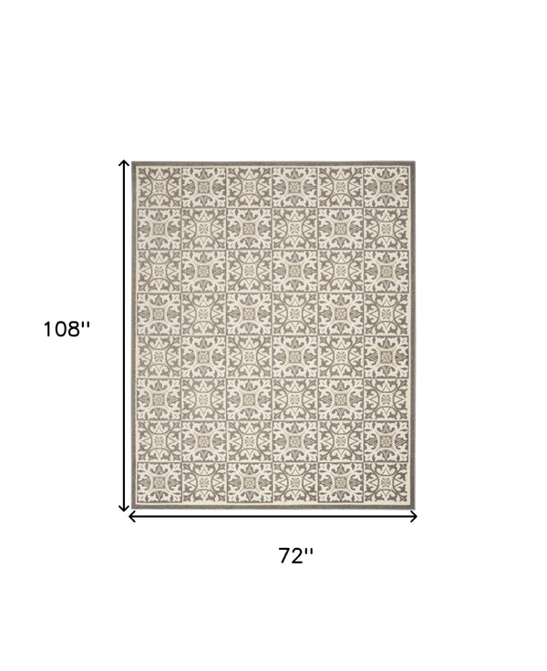 Homeroots 6' X 9' Ivory And Grey Fleur De Lis Stain Resistant Non Skid Area Rug  Polypropylene 505660