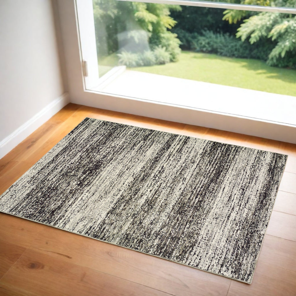 Homeroots 2' X 3' Gray And Ivory Abstract Power Loom Area Rug Ash,Charcoal Polypropylene 505771