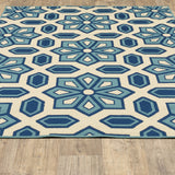 Homeroots 7' X 10' Ivory And Blue Geometric Stain Resistant Indoor Outdoor Area Rug  Polypropylene 506782