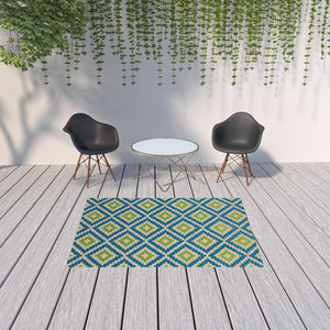 HomeRoots 5' Blue and Beige Geometric Indoor Outdoor Area Rug - Durable, Stain-Resistant, Modern Design for All Spaces 5'3" x 7'6" 506788