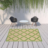 Homeroots 7' X 10' Green Geometric Stain Resistant Indoor Outdoor Area Rug Sand,Green Polypropylene 506795