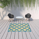 Homeroots 5' X 8' Blue And Beige Geometric Stain Resistant Indoor Outdoor Area Rug Sand,Blue Polypropylene 506800