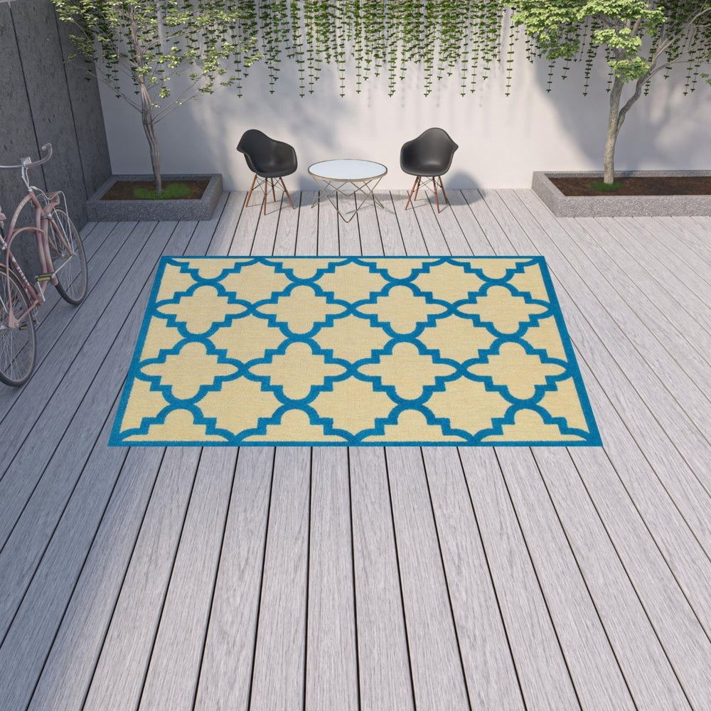 HomeRoots 5' Green Geometric Indoor/Outdoor Area Rug - Stain Resistant, Modern Style for High-Traffic Spaces Sand/ Blue 9'10" x 12'10" 506803