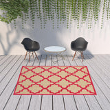 Homeroots 7' X 10' Red Geometric Stain Resistant Indoor Outdoor Area Rug Sand,Pink Polypropylene 506819