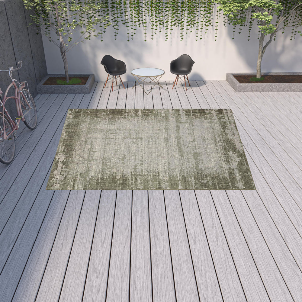 Homeroots 10' X 13' Green And Ivory Abstract Stain Resistant Indoor Outdoor Area Rug  Polypropylene 506862