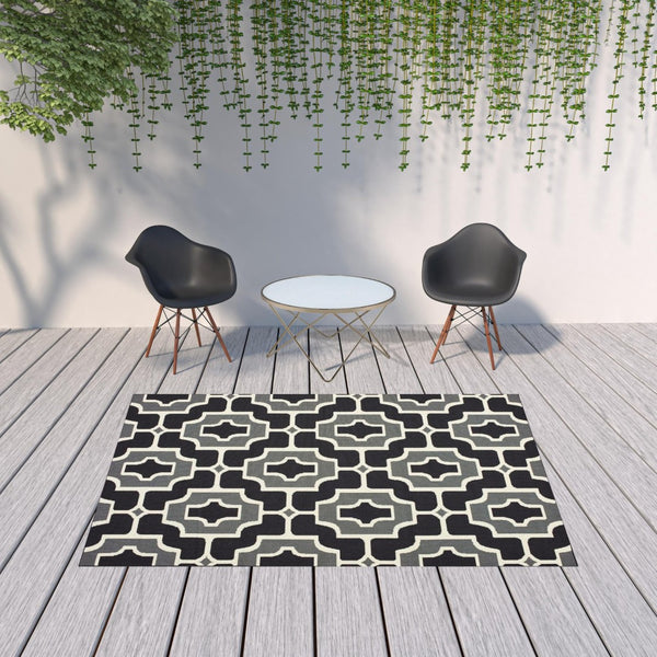 HomeRoots 5' Geometric Black and Gray Area Rug - Stain Resistant, Modern Design for Indoor and Outdoor Use 6'7" x 9'6" 507000