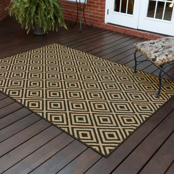 Homeroots 5' X 8' Black And Tan Geometric Stain Resistant Indoor Outdoor Area Rug  Polypropylene 507008