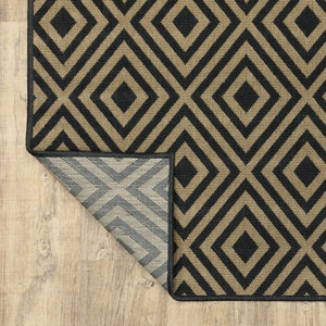 Homeroots 5' X 8' Black And Tan Geometric Stain Resistant Indoor Outdoor Area Rug  Polypropylene 507008
