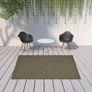 Homeroots 7' X 10' Black And Tan Geometric Stain Resistant Indoor Outdoor Area Rug  Polypropylene 507009