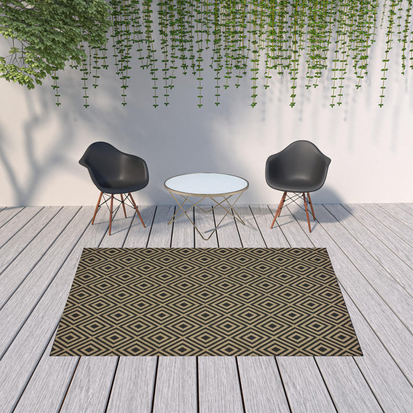 Homeroots 7' X 10' Black And Tan Geometric Stain Resistant Indoor Outdoor Area Rug  Polypropylene 507009