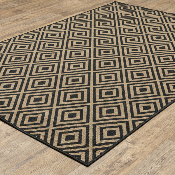 Homeroots 7' X 10' Black And Tan Geometric Stain Resistant Indoor Outdoor Area Rug  Polypropylene 507009