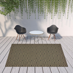 Homeroots 8' X 11' Black And Tan Geometric Stain Resistant Indoor Outdoor Area Rug  Polypropylene 507010