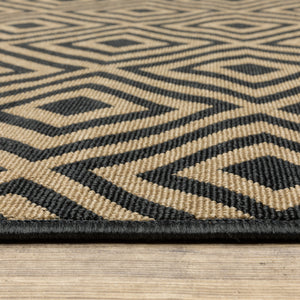Homeroots 8' X 11' Black And Tan Geometric Stain Resistant Indoor Outdoor Area Rug  Polypropylene 507010