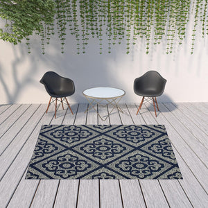 HomeRoots 5' Blue and Ivory Geometric Area Rug - Stylish, Stain Resistant, Perfect for Indoor and Outdoor Use 6'7" x 9'6" 507027