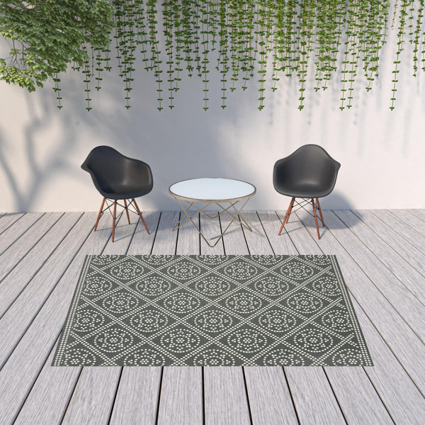 HomeRoots 5' Gray and Ivory Geometric Area Rug - Stain Resistant, Versatile for Indoor and Outdoor Spaces 6'7" x 9'6" 507036