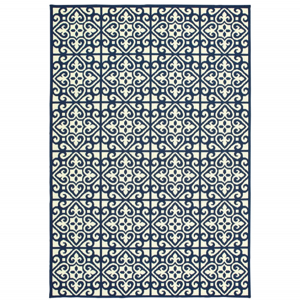 HomeRoots 5' Indoor Outdoor Area Rug in Ivory and Blue – Stylish Geometric Design, Durable, Stain Resistant 5'3" x 7'6" 507044