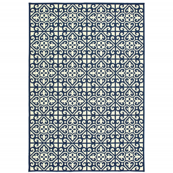 HomeRoots 5' Indoor Outdoor Area Rug in Ivory and Blue – Stylish Geometric Design, Durable, Stain Resistant 5'3" x 7'6" 507044