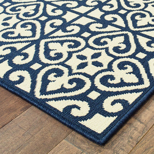 HomeRoots 5' Indoor Outdoor Area Rug in Ivory and Blue – Stylish Geometric Design, Durable, Stain Resistant 5'3" x 7'6" 507044