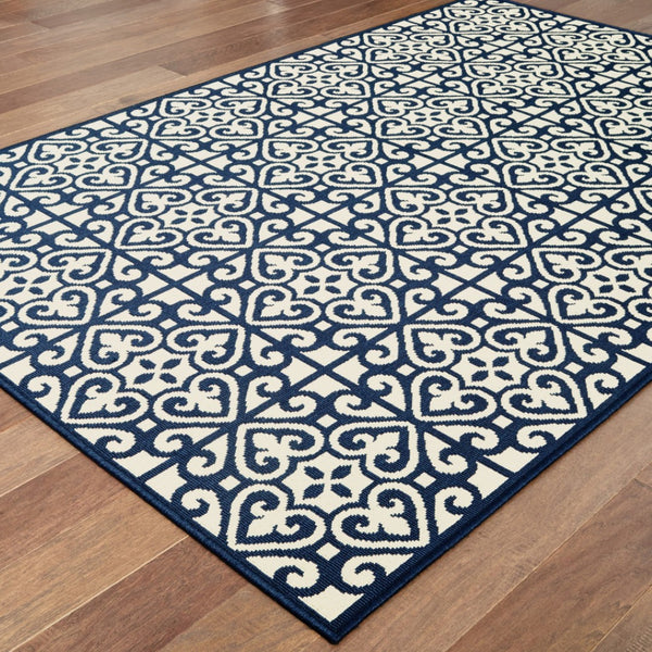 HomeRoots 5' Indoor Outdoor Area Rug in Ivory and Blue – Stylish Geometric Design, Durable, Stain Resistant 5'3" x 7'6" 507044