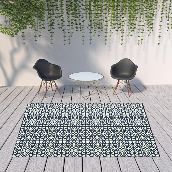 HomeRoots 5' Indoor Outdoor Area Rug in Ivory and Blue – Stylish Geometric Design, Durable, Stain Resistant 7'10" x 10'10" 507046