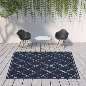 HomeRoots 5' Indoor Outdoor Geometric Area Rug - Stain Resistant Blue and Ivory Design for Versatile Spaces Navy/ Ivory 7'10" x 10'10" 507073