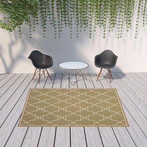 HomeRoots 5' Indoor Outdoor Geometric Area Rug - Stain Resistant Blue and Ivory Design for Versatile Spaces Tan/ Ivory 6'7" x 9'6" 507081