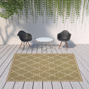 HomeRoots 5' Indoor Outdoor Geometric Area Rug - Stain Resistant Blue and Ivory Design for Versatile Spaces Tan/ Ivory 7'10" x 10'10" 507082