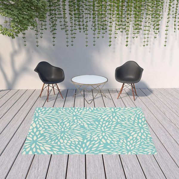 HomeRoots 5' Blue and Ivory Floral Area Rug – Stain Resistant, Durable Design for Indoor and Outdoor Spaces 6'7" x 9'6" 507089