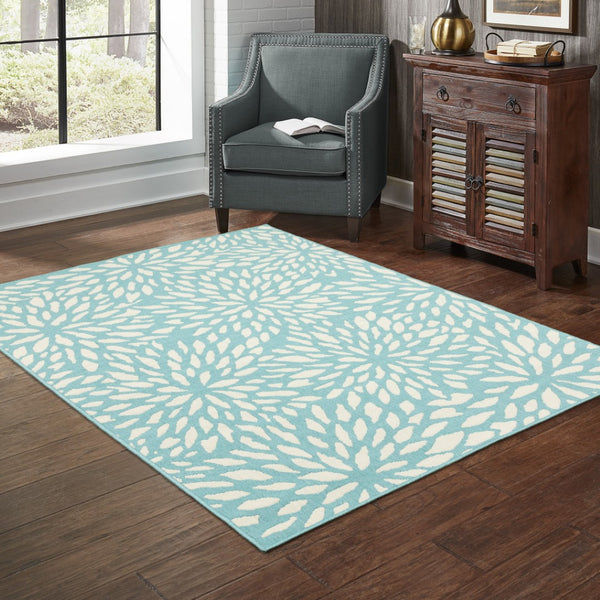 HomeRoots 5' Blue and Ivory Floral Area Rug – Stain Resistant, Durable Design for Indoor and Outdoor Spaces 6'7" x 9'6" 507089