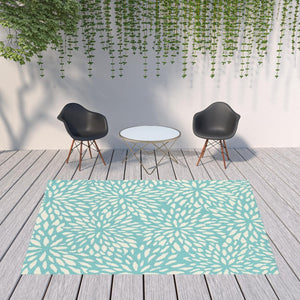 HomeRoots 5' Blue and Ivory Floral Area Rug – Stain Resistant, Durable Design for Indoor and Outdoor Spaces 7'10" x 10'10" 507090