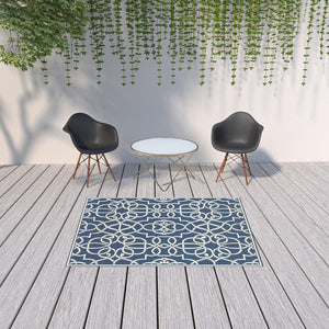 HomeRoots 5' Blue and Ivory Geometric Area Rug – Stain Resistant, Stylish Design for High-Traffic Spaces 5'3" x 7'6" 507104