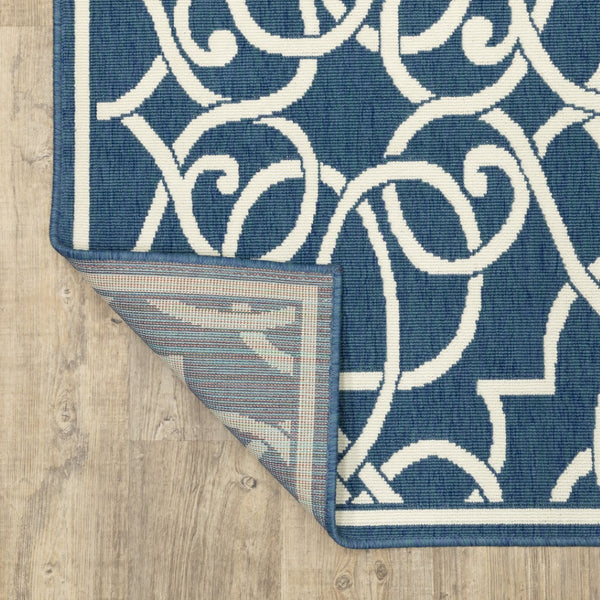 HomeRoots 5' Blue and Ivory Geometric Area Rug – Stain Resistant, Stylish Design for High-Traffic Spaces 5'3" x 7'6" 507104