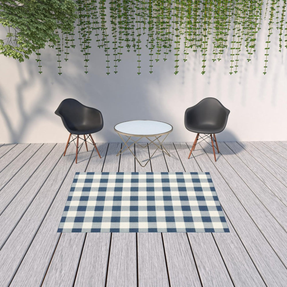 HomeRoots 5' Timeless Indoor Outdoor Area Rug - Durable, Stylish Design Perfect for Patios, Kitchens, and More Blue/ Ivory 5'3" x 7'6" 507136
