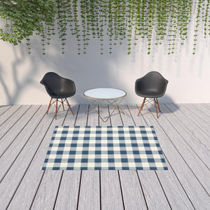 Homeroots 5' X 8' Blue And Ivory Geometric Stain Resistant Indoor Outdoor Area Rug Blue,Ivory Polypropylene 507136