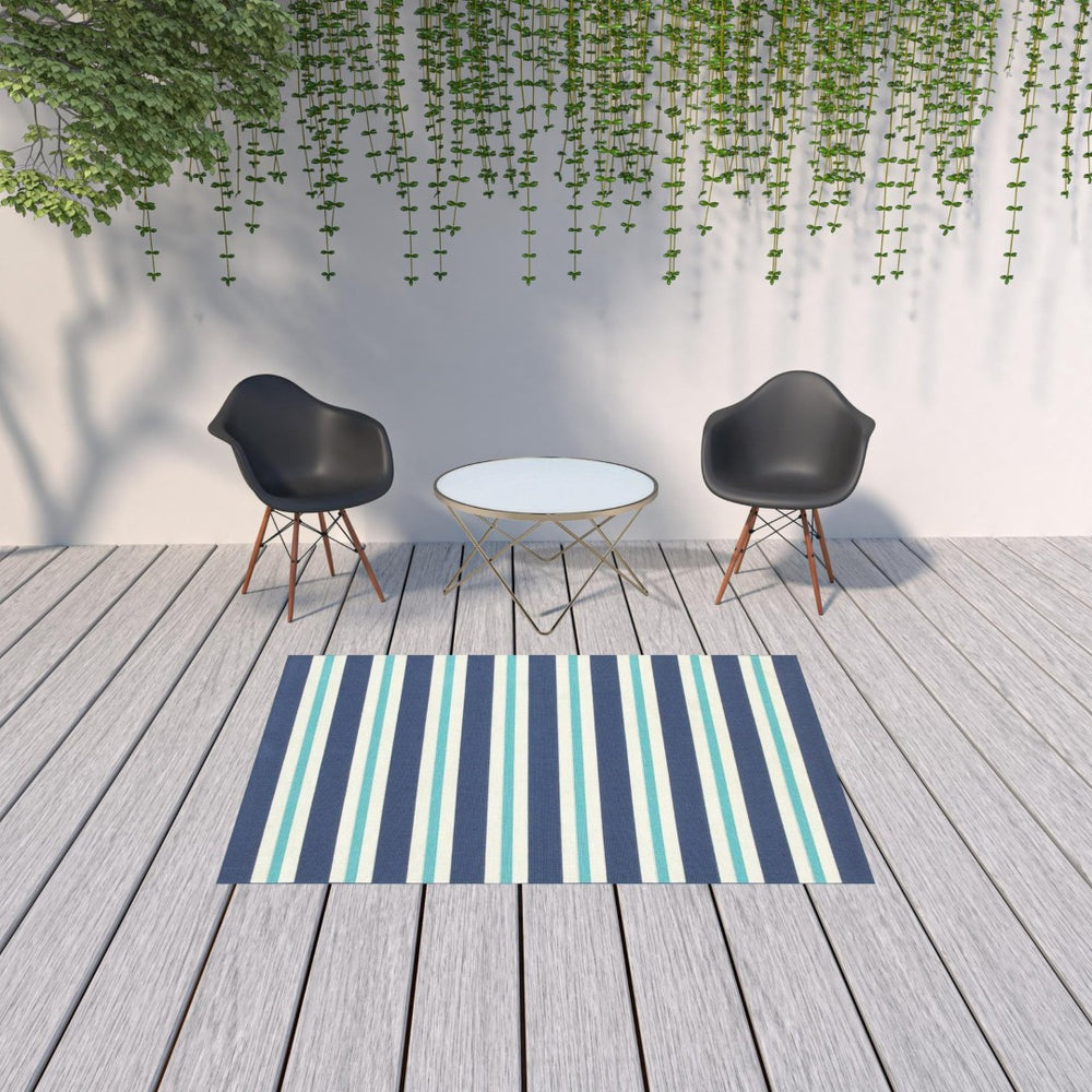 HomeRoots 5' Indoor Outdoor Geometric Area Rug - Stain Resistant, Durable, Stylish Design for High-Traffic Spaces Blue/ Ivory 5'3" x 7'6" 507144