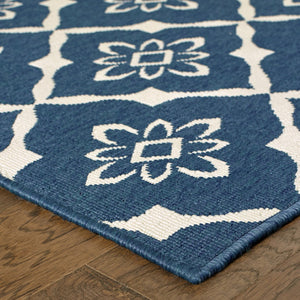 HomeRoots 5' Blue and Ivory Floral Area Rug - Stain Resistant, Durable Design for Indoor and Outdoor Spaces 6'7" x 9'6" 507161