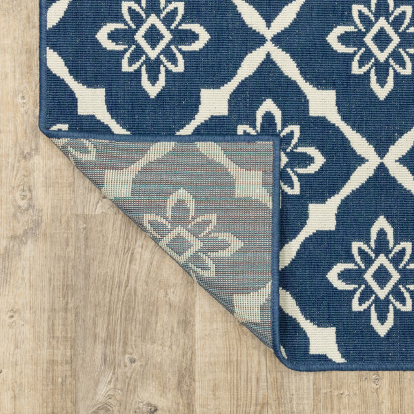 HomeRoots 5' Blue and Ivory Floral Area Rug - Stain Resistant, Durable Design for Indoor and Outdoor Spaces 6'7" x 9'6" 507161