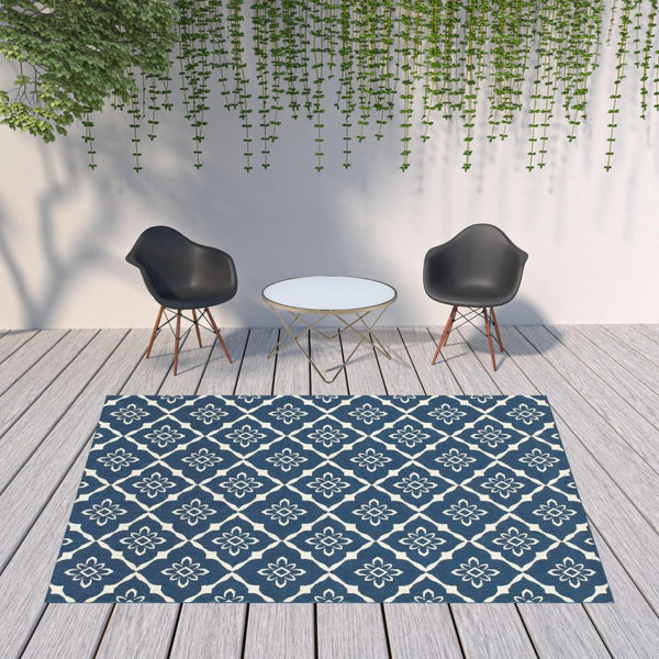 HomeRoots 5' Blue and Ivory Floral Area Rug - Stain Resistant, Durable Design for Indoor and Outdoor Spaces 7'10" x 10'10" 507162